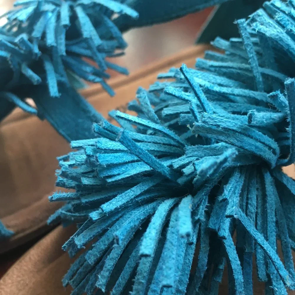 Minnetonka pompom fringe sandals 10
